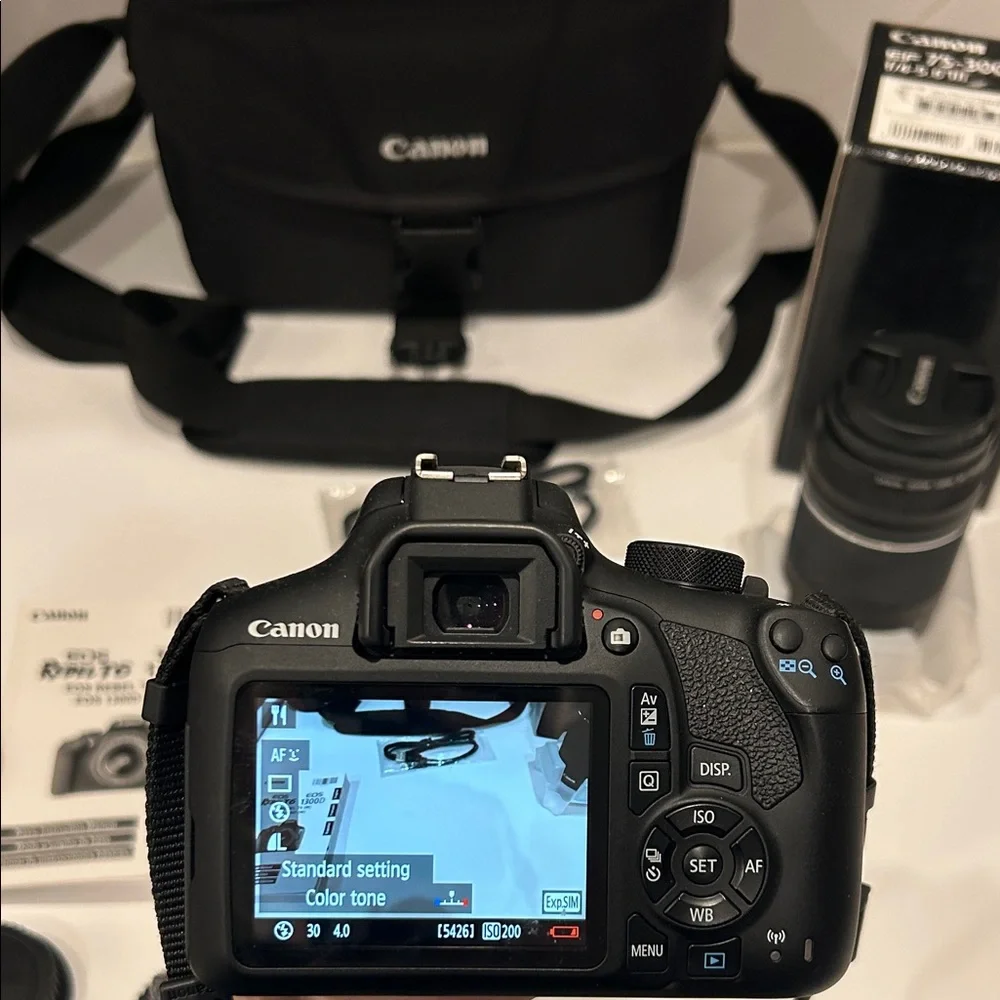 Canon EOS Rebel T6 1300D DSLR Camera with Black and Red Accents